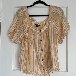 Yellow stripped button down top with slightly puffed sleeves